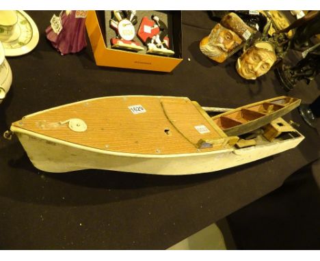 Large metal pond launch L: 90 cm with model wooden rowing boat  A/F CONDITION REPORT: Large metal pond launch lacking engine.