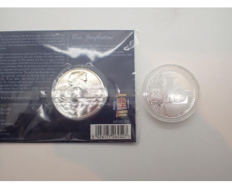 2012 £5.00 coin as issued and a one troy ounce silver coin