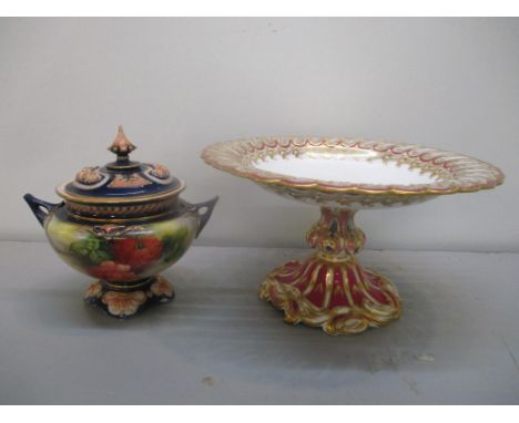 A Royal Worcester Hadley ware twin handled pot and cover, together with a centrepiece painted bowl with gilt highlightsLocati