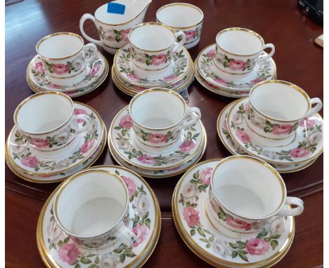 A Royal Worcester 'Royal Garden' part tea set comprising 8 tea cups, 8 saucers, 10 side plates, a milk jug and sugar bowlLoca