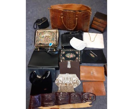 Early to mid 20th Century handbags and evening bags to include a brown crocodile handbag, French and Flemish fine bead evenin