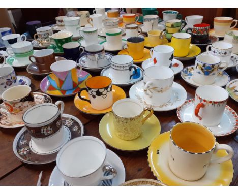 A large collection of 20th century coffee cans and matching saucers to include Burleigh, Royal Worcester, Soho Pottery, Newha