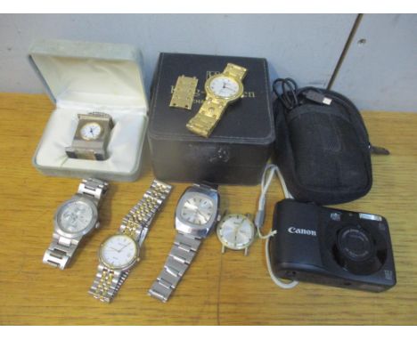 Mixed watches to include a gents Montine manual wind watch, together with a miniature travel clock and a Canon Powershot A120
