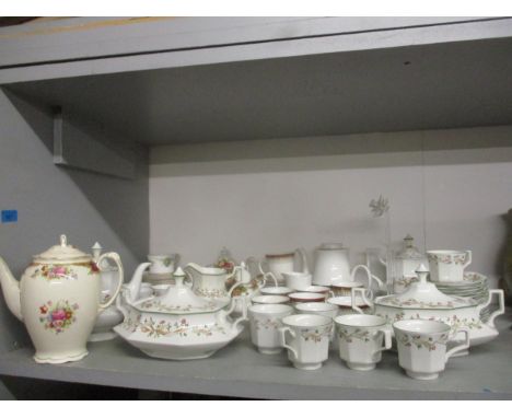 A mixed lot of household table china to include a Royal Albert Country Roses coffee and teapot, Eternal Beau part dinner serv