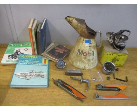 A mixed lot of motoring vintage memorabilia to include a Mobil 5 litre metal jug, car and motor cycling magazines, AKNE Easil