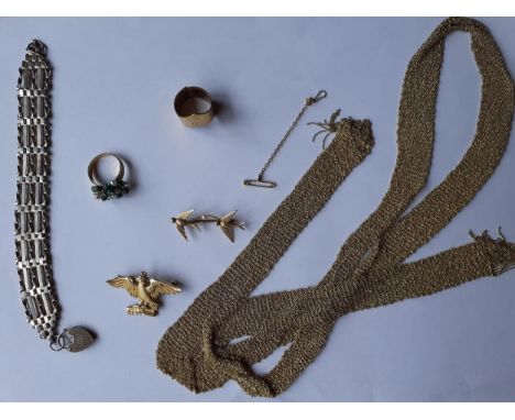 A silver gilt chain necklace in the style of a belt, stamped Italy 925 together with a silver gilt brooch of a bird with open