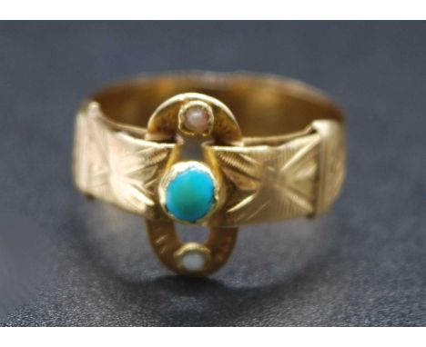 A circa 1900 yellow metal, turquoise and seed pearl set belt ring, having proud buckle and engraved decoration, unmarked but 