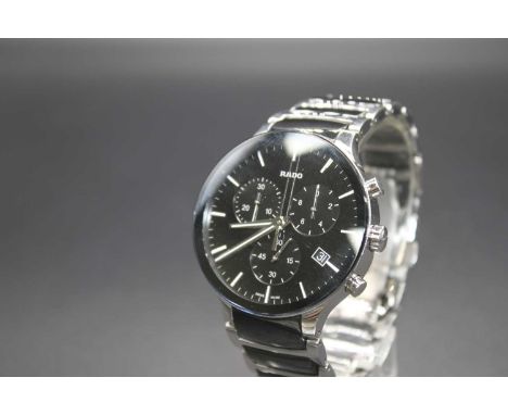A Rado Centrix gents bi-metal bracelet quartz wrist watch having a signed black main dial with triple subsidiary dials with f