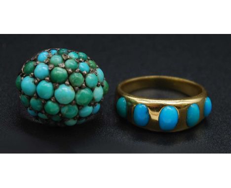 An early 20th century yellow metal turquoise set half hoop ring, arranged as five graduated cabochon turquoise, unmarked but 