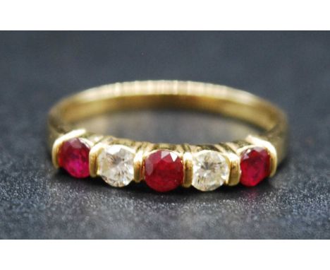 An 18ct yellow gold, ruby and diamond half eternity ring, featuring three rubies and two diamonds in bar settings, ruby dimen