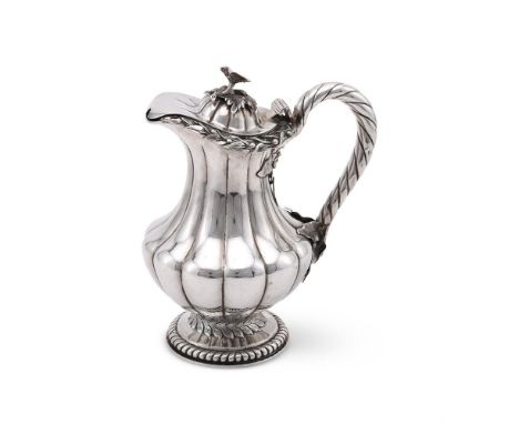 
	
		AN INDIAN COLONIAL SILVER BALUSTER JUG
		HAMILTON &amp; CO., CALCUTTA, CIRCA 1850
		With a flower finial to the domed co