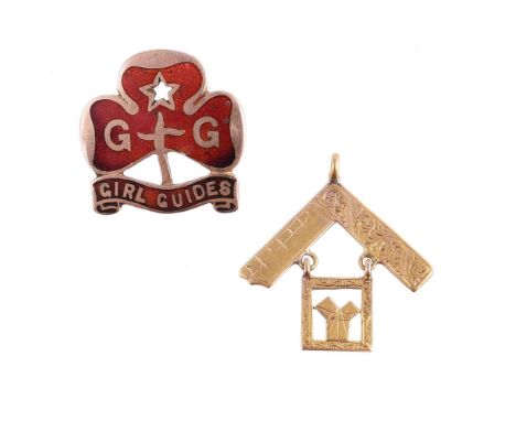 
	
		A LATE VICTORIAN MASONIC PAST MASTER JEWEL AND A 1930S GIRL GUIDES BROOCH
		The 9 carat gold masonic pendant with set sq