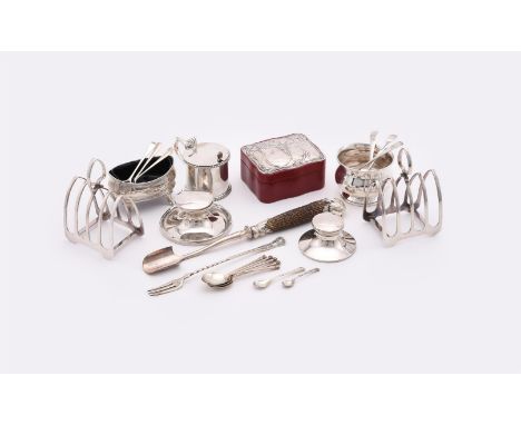 
	
		A COLLECTION OF SILVER ITEMS
		To include: a pair of four division toast racks by Roberts &amp; Belk Ltd., Sheffield 197