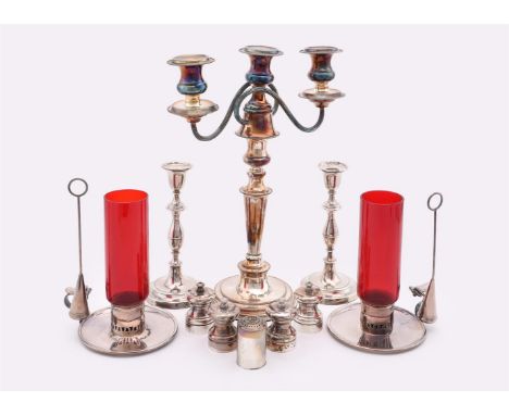 
	
		A COLLECTION OF ELECTRO-PLATED ITEMS
		To include: a three light candelabra; a pair of chambersticks with red glass shad