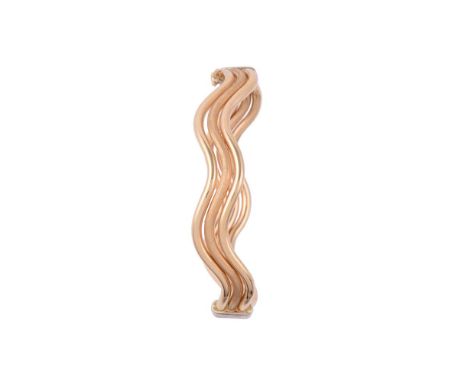 
	
		AN UNDULATING GOLD COLOURED HINGED BANGLE
		The undulating polished and textured sprung hinged bangle to a concealed cla