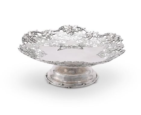 
	
		A SILVER CIRCULAR PIERCED PEDESTAL DISH
		ATKIN BROTHERS, SHEFFIELD 1932
		With a chased and pierced grape vine band and