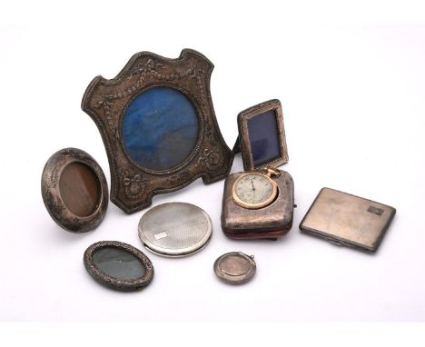 
	
		A COLLECTION OF SILVER ITEMS
		To include: an Edwardian silver mounted shaped square photo frame by Boots Pure Drug Comp