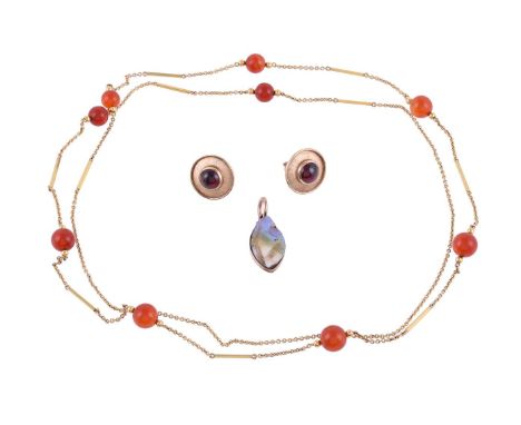 
	
		A CORNELIAN BEAD NECKLACE 
		The graduated cornelian orbs on a belcher link chain with gold coloured baton spacers; toge