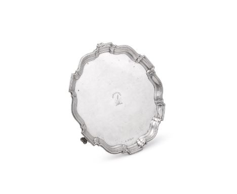 
	
		A SILVER SHAPED CIRCULAR SALVER
		BARKER BROTHERS SILVER LTD., BIRMINGHAM 1935
		With a raised moulded border, engraved 