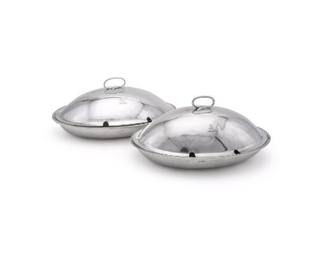 
	
		A PAIR OF GEORGE III SILVER OVAL ENTREE DISHES
		MAKER'S MARK OBSCURED, LONDON 1802, THE COVERS UNMARKED
		The covers wi
