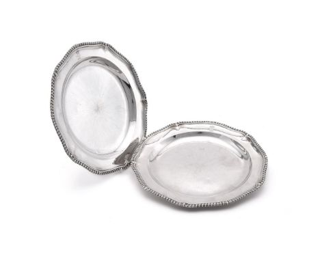 
	
		A PAIR OF GEORGE III SILVER SHAPED CIRCULAR PLATTERS
		POSSIBLY BY CHARLES WRIGHT, LONDON 1770
		With gadrooned borders,