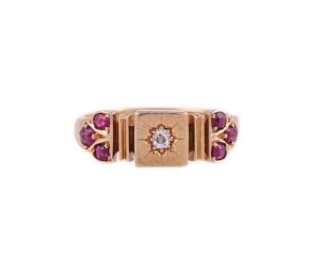 
	
		AN 18 CARAT GOLD VICTORIAN DIAMOND AND RUBY RING 
		BIRMINGHAM 1880
		The central square panel with a star set old cut d