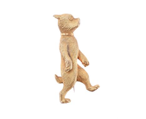 
	
		A NOVELTY MID 20TH CENTURY GOLD COLOURED DOG BROOCH
		The gold coloured dog walking upright, with textured fur and colla