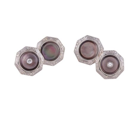 
	
		Y&nbsp;A PAIR OF DIAMOND AND MOTHER OF PEARL CUFFLINKS 
		SECOND QUARTER OF THE 20TH CENTURY
		The octagonal panels cent