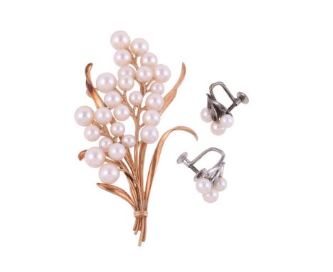 
	
		MIKIMOTO, A CULTURED PEARL BROOCH
		The floral spray brooch with graduated cultured pearl blooms, to gold coloured leave