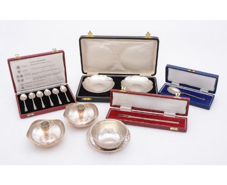 
	
		A COLLECTION OF SILVER ITEMS
		To include: a pair of silver shaped circular candlesticks by A. E. Jones, Birmingham 1985