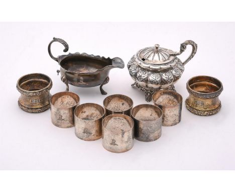 
	
		A COLLECTION OF SILVER ITEMS
		To include: a George II shaped oval sauce boat by Benjamin Cartwright I, London 1759, wit