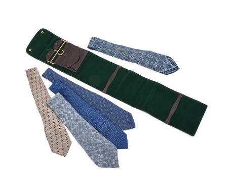 
	
		A COLLECTION OF SILK TIES
		To include: Hermes, a blue silk tie, with geometric and floral pattern; Hermes, a blue silk 
