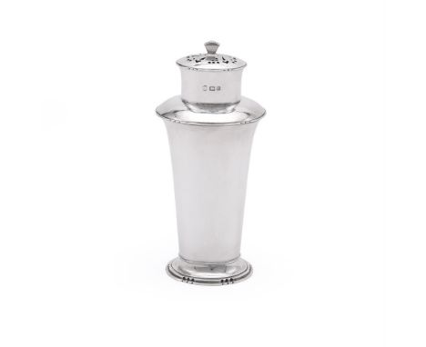 A SILVER TAPERING CASTOR P. G. DODD &amp; SON, LONDON 1937 With a shell shaped finial to the pierced oval cover, the tapering