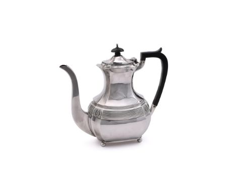 
	
		A SILVER OBLONG BALUSTER COFFEE POT
		FORDHAM &amp; FAULKNER, SHEFFIELD 1913
		With a wood domed finial and angular hand