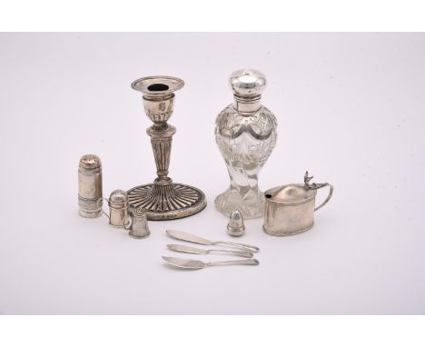 
	
		A COLLECTION OF SILVER ITEMS
		To include: an Edwardian silver candlestick by Williams (Birmingham) Ltd., Birmingham 190