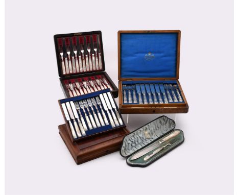 
	
		Y&nbsp;FOUR CASED SETS OF FLATWARE
		Comprising: a set of twelve silver forks and knives, the blades sand tines by Georg