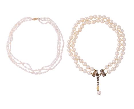 
	
		CHANEL, TA PRIX TTC, A SIMULATED PEARL NECKLACE 
		CIRCA 1990
		The two rows of simulated pearls to a gilt metal simulat