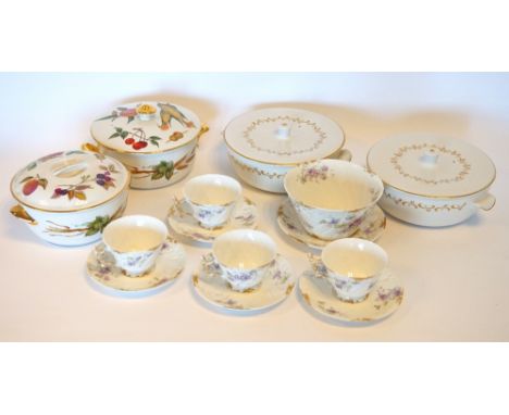 LIMOGES PART TEA SERVICE
decorated with lilac flowers and a part gilt border, comprising eighteen pieces; two Royal Worcester