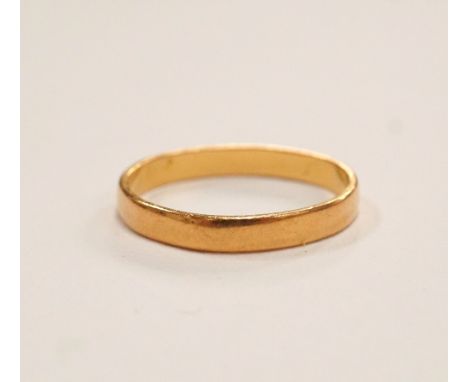 TWENTY-TWO CARAT GOLD WEDDING BAND
ring size J-K and approximately 1.9 grams