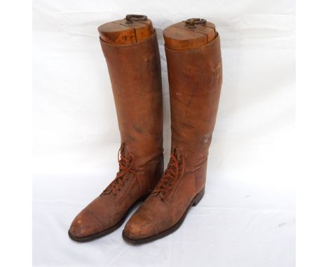 PAIR OF BRITISH ARMY OFFICER'S HIGH TAN LEATHER BOOTS
early 20th century, with shaped wooden boot trees, approximately size 9