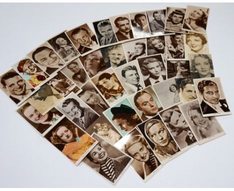 COLLECTION OF CINEMA PORTRAIT POSTCARDS
1920/1950's, includes Charlie Chaplin, Rudolph Valentino, Claudette Colbert, Edward G