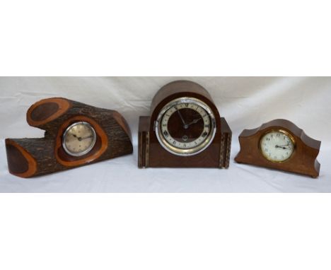 'GOBLIN' MANTEL CLOCK
contained in an Australian Mulga wood case; together with an Edwardian mahogany and inlaid mantel clock
