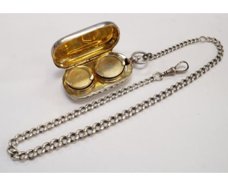 STERLING SILVER SOVEREIGN AND HALF SOVEREIGN CASE
with engine turned decoration and gilt interior, with graduated silver Albe