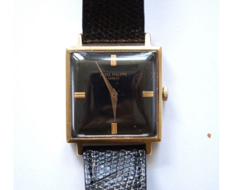 LADIES REPLICA PATEK PHILLIPPE 9CT GOLD WRISTWATCH
with a signed square black face with baton markers at 12, 3, 6 and 9, with