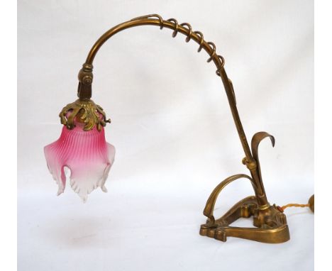 FRENCH ART NOUVEAU STYLE ADJUSTABLE BRASS DESK LAMP
modelled as a stylised flower, with a shaped glass two tone shade, 37cm h