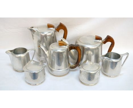 RETRO STAINLESS STEEL PIQUOT WARE TEA AND COFFEE SERVICE
comprising coffee pot, tea pot, hot water jug, two sugar bowls and t