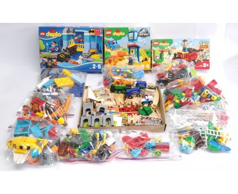 Duplo/Brio mixed group to include (1) Duplo #10599 Batman Adventure within original box; (2) Duplo #10880 Jurassic World T-Re