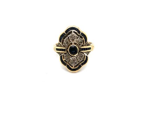 A vintage 9ct hallmarked gold sapphire and diamond panel ring. Finger size M. Weight 3.71 grams. 