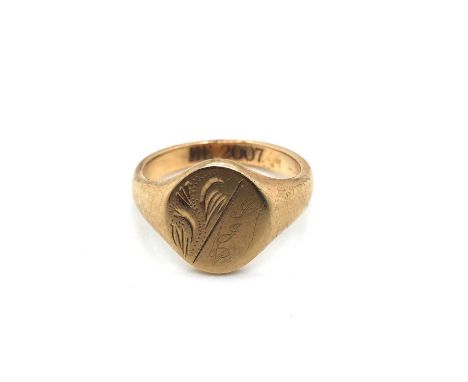 A 9ct hallmarked gold Oxford oval signet ring, engraved to inside band HE 2007. Finger size U 1/2. Weight 8.01 grams.