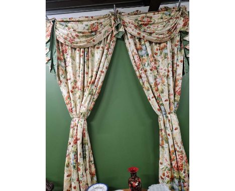 Two pairs of floral pattern lined curtains with swag pelmets